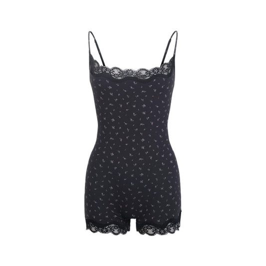 Black lace-trimmed romper on a white background